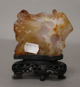 A Chinese agate brush rest on stand. 11.5 cm high.