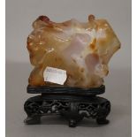 A Chinese agate brush rest on stand. 11.5 cm high.