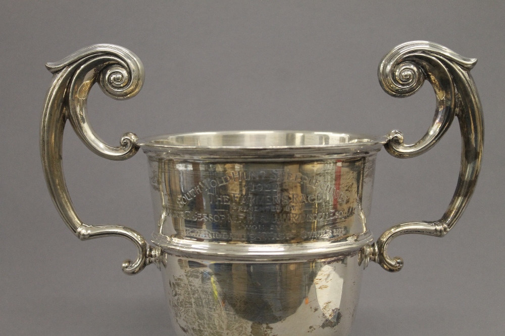 An engraved silver trophy cup on stand. 33.5 cm high overall. 25.1 troy ounces. - Image 3 of 6