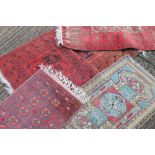 Four small rugs. The largest 135 x 78 cm.