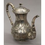 A Chinese silver coffee pot. 21 cm high. 21 troy ounces.