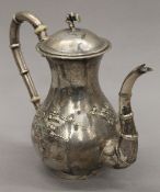 A Chinese silver coffee pot. 21 cm high. 21 troy ounces.