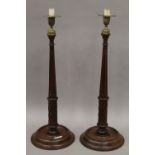 A large pair of Victorian mahogany candlesticks. 53 cm high.