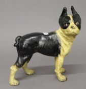 A cast iron model of a pug dog. 25 cm high.