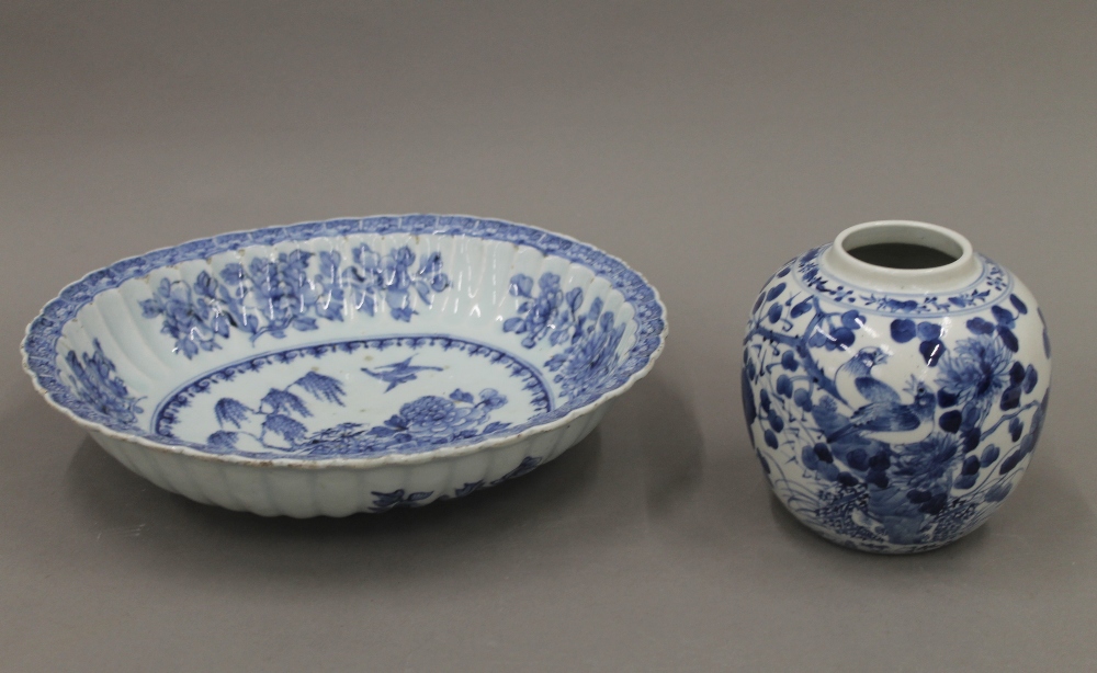 An 18th century Chinese blue and white porcelain bowl and a 19th century blue and white porcelain