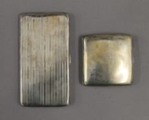 Two silver cigarette cases. The largest 15.5 cm wide. 11.9 troy ounces.