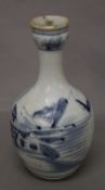 A Chinese blue and white porcelain bottle vase. 21.5 cm high.