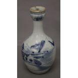 A Chinese blue and white porcelain bottle vase. 21.5 cm high.