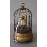 A bird cage clock. 17 cm high.