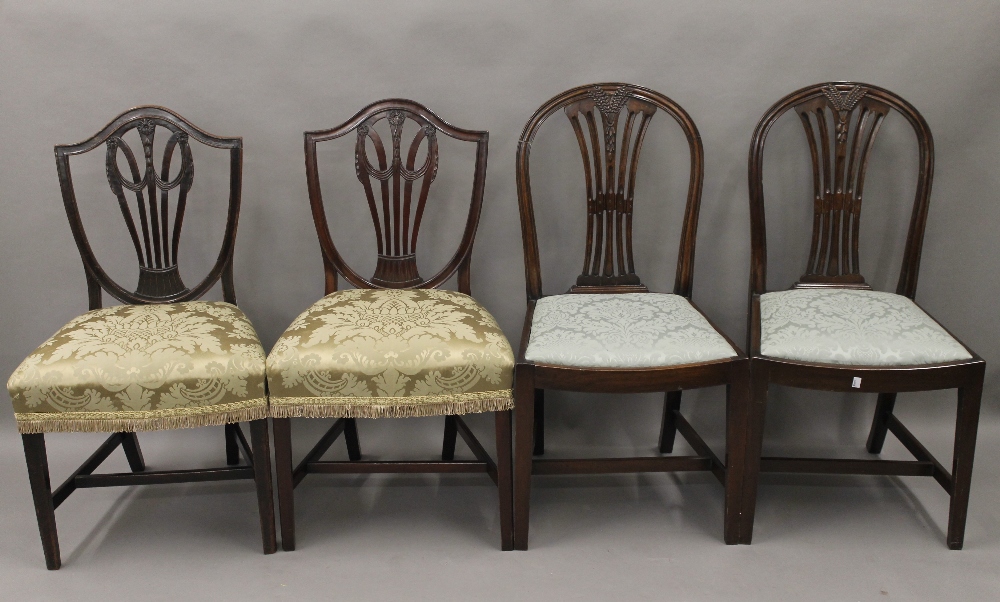 Three pairs mahogany dining chairs.