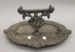 A 19th century cast iron boot scraper. 40 cm wide.