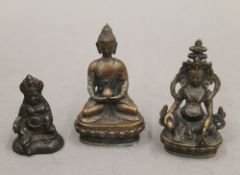 Three bronze Buddhas. The largest 19 cm high.