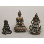 Three bronze Buddhas. The largest 19 cm high.