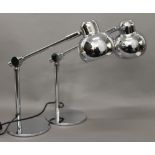 A pair of chrome adjustable lamps. 38 cm high.