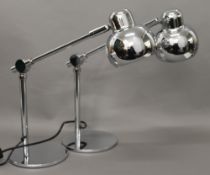 A pair of chrome adjustable lamps. 38 cm high.