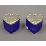 A pair of silver topped heart shaped glass boxes. 3.5 cm high.