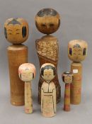 Six Japanese Kokeshi dolls. The largest 45 cm high.