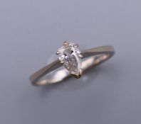A 14 ct white gold marquise cut diamond ring. Ring size K/L.
