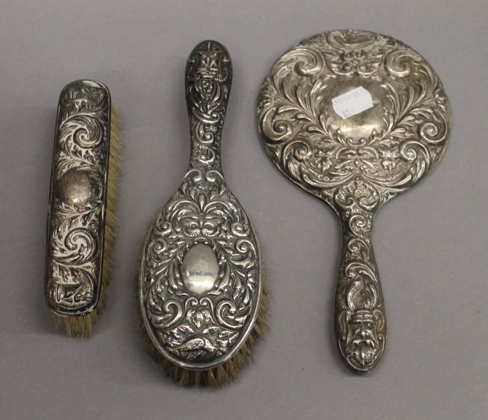 A quantity of silver backed dressing table brushes and mirrors. 52.8 troy ounces total weight. - Image 2 of 6