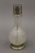 An antique Dutch silver mounted cut glass four-section cruet bottle. 14.5 cm high.