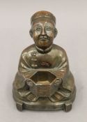 A Chinese bronzed spelter figure. 15.5 cm high.