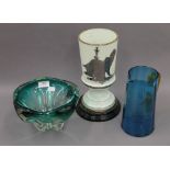 A Victorian glass oil lamp base, a blue glass jug and an art glass vase. The former 28 cm high.