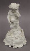 A Meissen blanc de chine porcelain cherub. 22 cm high.