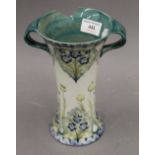 A Moorcroft Macintyre twin handled vase (AF). 20.5 cm high.