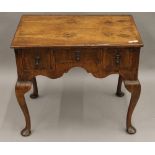 An 18th/19th century walnut lowboy. 71.5 cm wide.