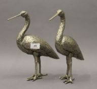 A pair of plated storks. 26.5 cm high.