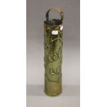 A Trench Art shell. 35 cm high.