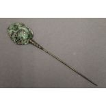 A Chinese jade mounted hair pin. 17.5 cm long.
