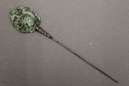 A Chinese jade mounted hair pin. 17.5 cm long.