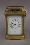 An early 20th century eight-day chiming and repeating Paris made carriage clock,