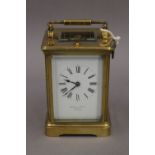 An early 20th century eight-day chiming and repeating Paris made carriage clock,