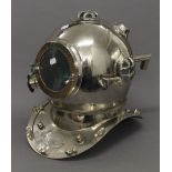 A chrome model divers helmet. 37 cm high.