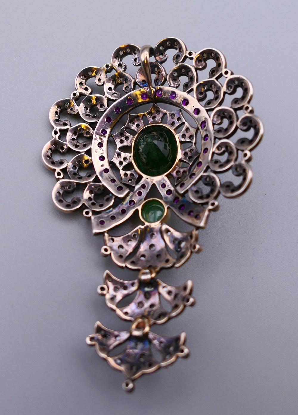 A vintage silver and gold mounted emerald, diamond and ruby pendant. 7.5 cm high. 21. - Image 3 of 5