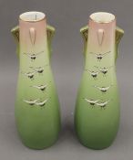 A pair of pottery vases decorated with cranes. 31 cm high.