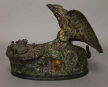 A cast iron bird form money box. 20 cm long.