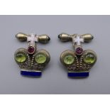 A pair of silver cufflinks, bearing Russian marks. 2 cm high.