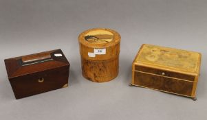 A Victorian mahogany tea caddy and two inlaid boxes. The former 19.5 cm wide.