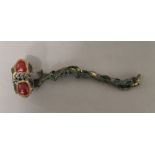 A Chinese ruyi sceptre. 27 cm long.