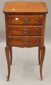 A 19th century style inlaid set of drawers. 80 cm high.