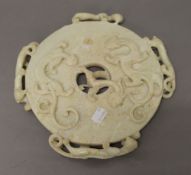 A white jade bi-disc. 26 cm diameter.