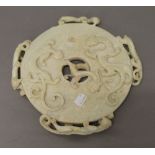 A white jade bi-disc. 26 cm diameter.