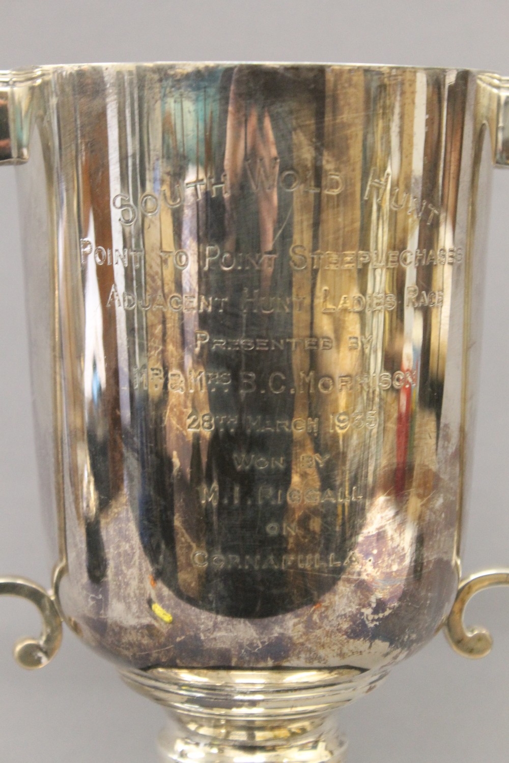 An engraved silver trophy cup on stand. 33.5 cm high overall. 30.2 troy ounces total weight. - Image 3 of 4
