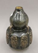 A Chinese black double gourd vase. 28 cm high.