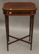 A Victorian mahogany work table. 48 cm wide.