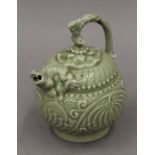 A Chinese celadon water dropper. 15.5 cm high.