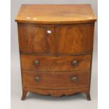 A George III mahogany commode. 60.5 cm wide.